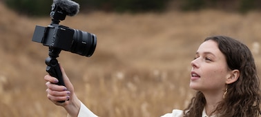 Image d’une femme prenant des photos à l’extérieur avec un cadran