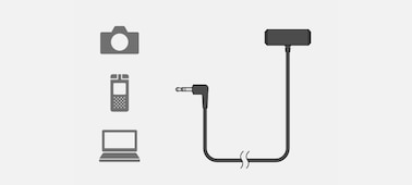 illustration montrant la compatibilité avec des appareils électroniques via la prise pour microphone de 3,5 mm.